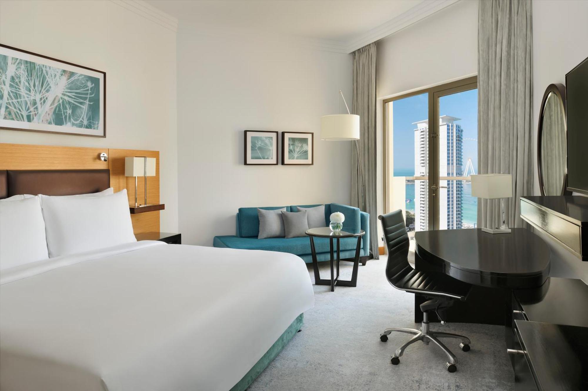 Hébergement Lit King-Size Deluxe avec Balcon - Vue Partielle sur Mer 